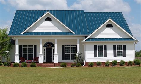 blue house white trim brown metal roof|blue metal roof interior.